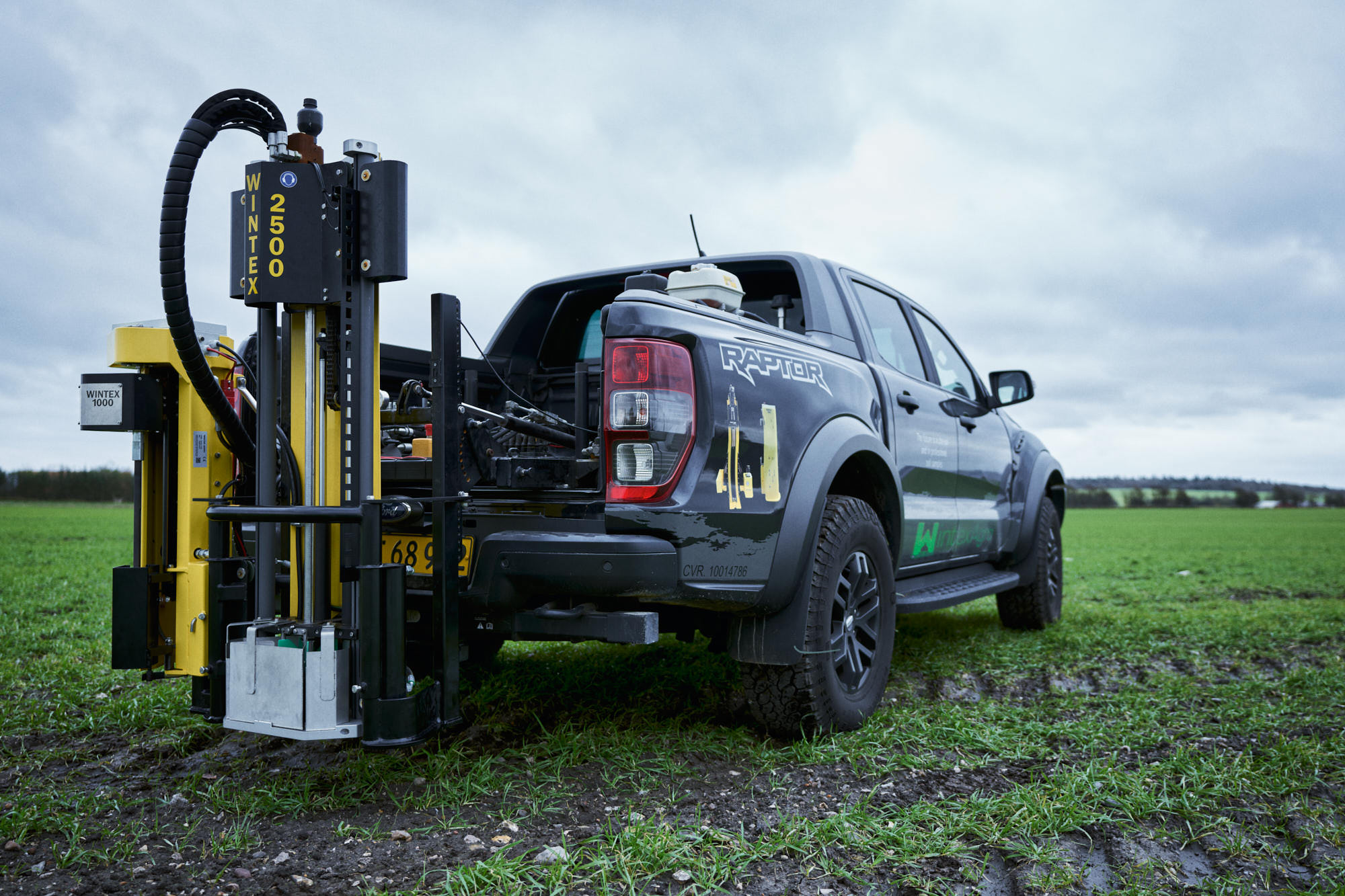 A Wintex 2500 automatic soil sampler mounted on a pickup in the field